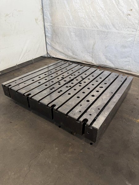 60&quot; WIDE X 67&quot; LONG X 9&quot; THICK T-SLOTTED BOLSTER PLATE. STOCK # 1006324