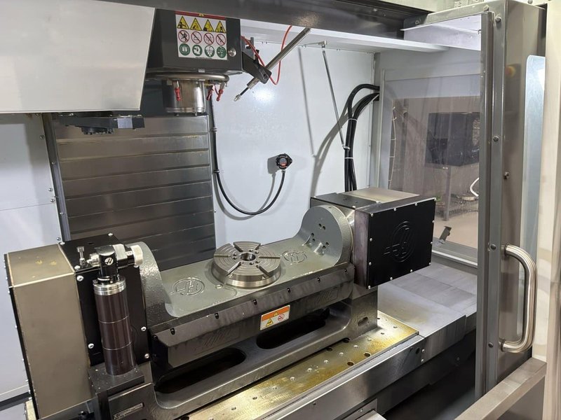 Haas VF-3 VMC, 2021 – TR-210 5th Axis, 50 ATC, WIPS, HSM, 15K RPM, Chip Auger