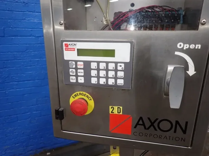 AXON CORPORATION SLEEVE LABEL APPLICATOR  -  EZ-100