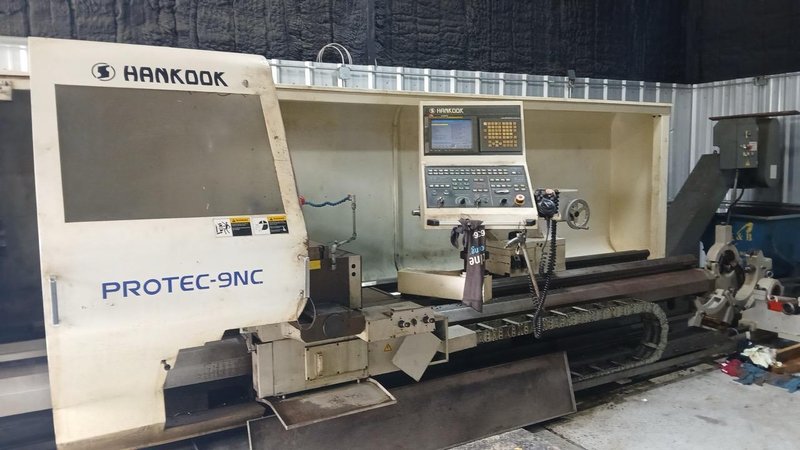 37.4″ x 156″ Hankook Protec 9NC 10″ Spindle Bore, Dual Chucks, 2006 – Chip Conveyor, 8 Station Turret