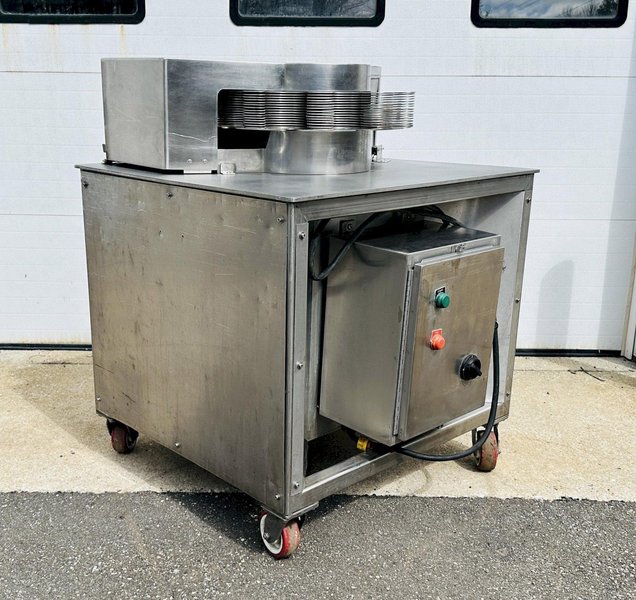 Urschel Laboratories Inc.  |  10 Station Semi-Automatic Rotating Onion Slicer