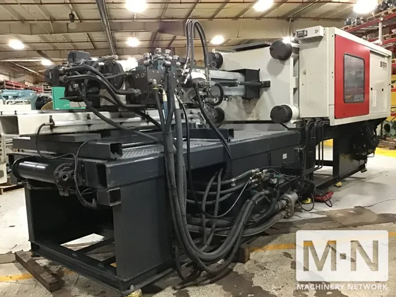 310 TON 36 OZ FERROMATIK MILACRON MODEL MT310-36 WIDE PLATEN INJECTION MOLDING MACHINE MFG 2001