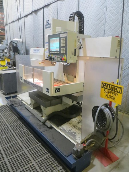 Milltronics Partner MM18 Vertical CNC Machining Center W Milltronics 7200 Control, 16 Station Carousel Tool Changer, Coolant Tank &amp; Pump and MORE!- Auction Item