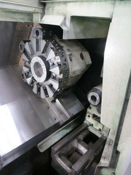 Okuma Genos L250E CNC Turning Center, OSP-P300L/R CNC Control, 8&quot; Chuck, Tool Setter, Parts Catcher, 12-Station Turret, Tailstock, Chip Conveyor
