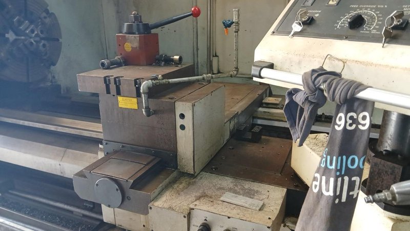 37.4″ x 156″ Hankook Protec 9NC 10″ Spindle Bore, Dual Chucks, 2006 – Chip Conveyor, 8 Station Turret