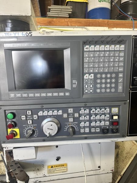 Okuma ES L8 CNC Lathe, 1999 – Tailstock, Chip Conveyor