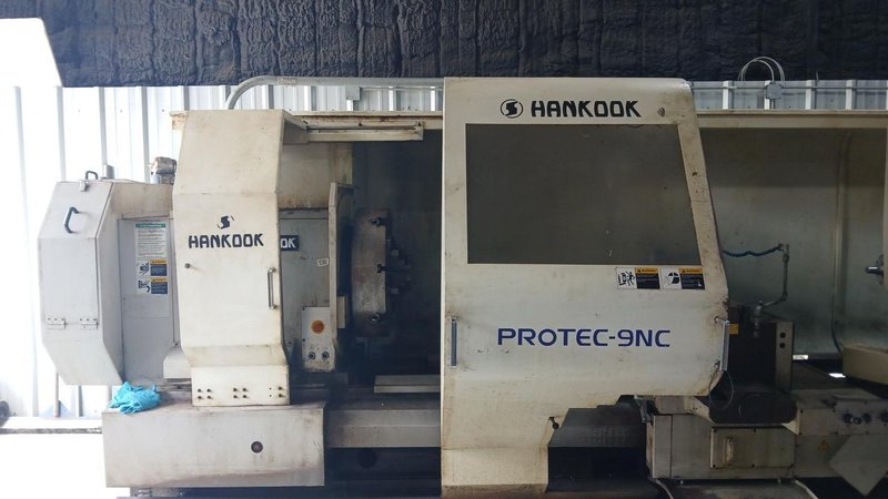 37.4″ x 156″ Hankook Protec 9NC 10″ Spindle Bore, Dual Chucks, 2006 – Chip Conveyor, 8 Station Turret