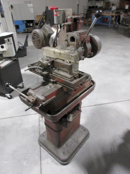 Barker Model AM,  3 Axis Milling Machine, with Pneumatic Clamping System and Pedestal Stand.- Auction Item