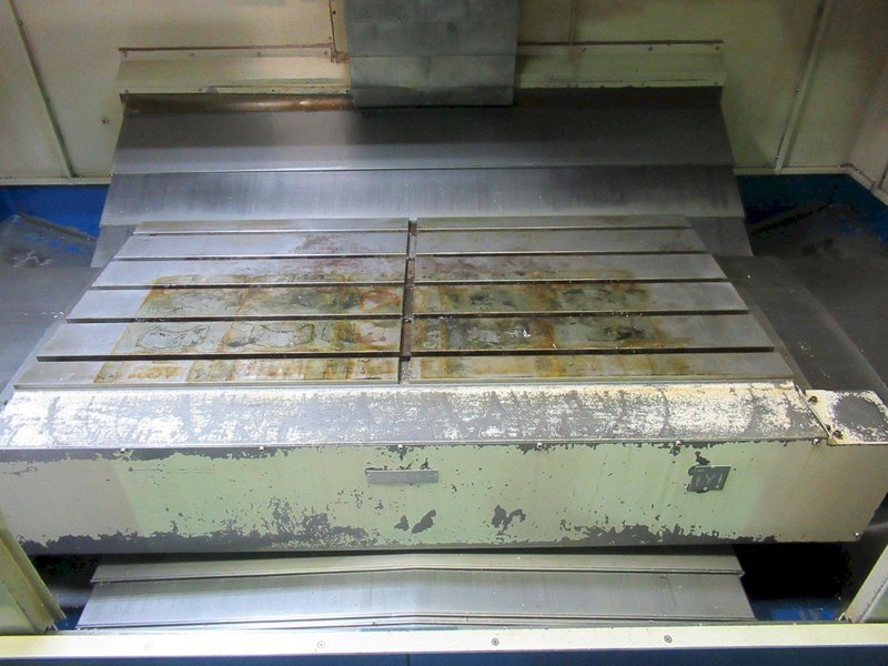 Daewoo DMV-5025 CNC Vertical Machining Center with Fanuc 21i-MB, 24 ATC, 12K RPM, Thru Spindle Coolant, Chip Conveyor- Auction Item