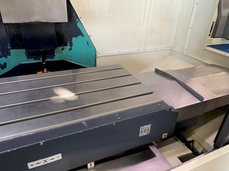 2014 DOOSAN MYNX 5400 with Chip Conveyor Vertical Machining Center