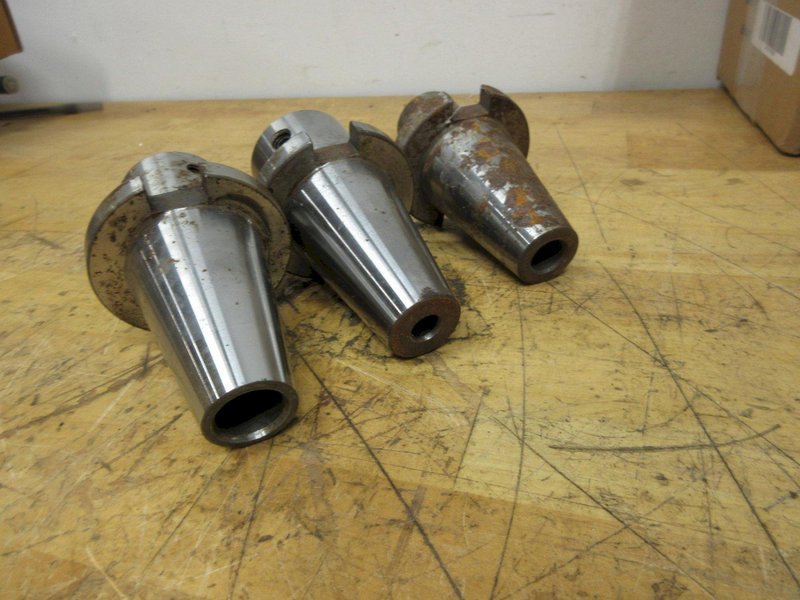 Redline CAT50 Shell Mill Holder, Sandvik 4.5" Shell Mill, ER32 Collet Wrenches, Box of Loc-Line, Zebra Refractometer, 3 Uknown Tool Holders- Auction Item