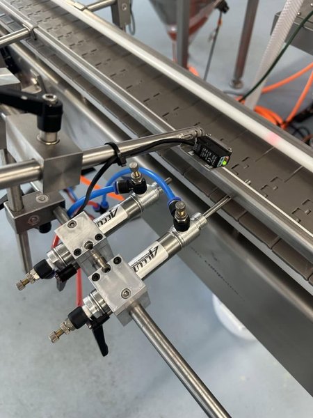 Accutek SVF 02-002-000 Single Piston Filler with Conveyor, Heated and Agitated Hopper, and E-Pak Accumulation Table, 2014