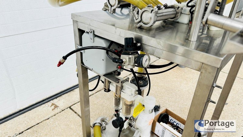 Inline Filling Systems  | Six-Headed Semi-Automatic  |  Overflow Filler