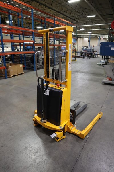 Uline H-2651 Electric Straddle Stacker Lift, 2,200# Cap, 63&quot; Max Height, 50&quot; Between Outriggers, 12 Volt Battery with Charger, 42&quot; Forks- Auction Item