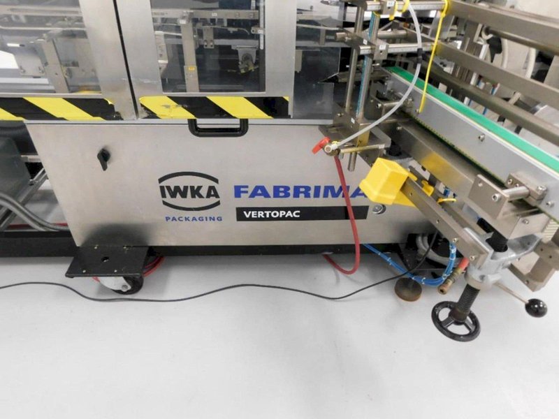 IWKA Fabrima Semi-Automatic Continuous-Motion Vertical Cartoner, Model VP-120, 2005 – Allen Bradley PanelView 600 Control – 8″ Centers, 2005