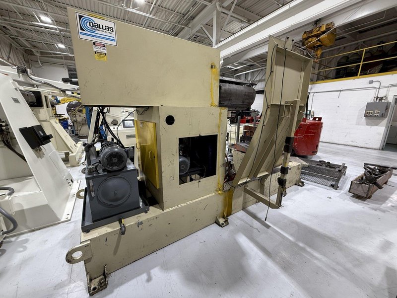 10,000 lbs. x 24&quot; Dallas Motorized Coil Reel with Car and Peeler, Threader and Hold Down Station, Year 1995