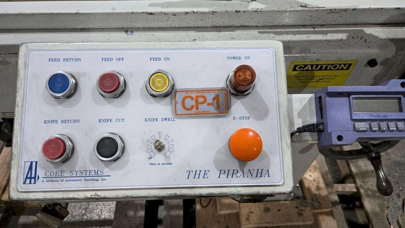 AUTOMATIC HANDLING PIRANHA-10 AUTOMATIC CORE CUTTER 3HP USED