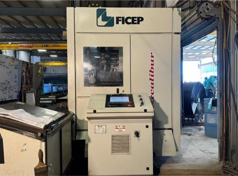Ficep Excalibur 1201 DE CNC Single Spindle Beam Drill, 2016 – 60′ Roller Table, 6 Station ATC
