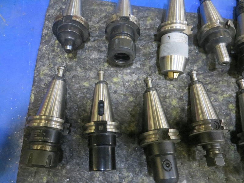 Cat 40 Taper Tool Holders (22) Including ER32, E16 Tool Holders, End Mills, and More- Auction Item