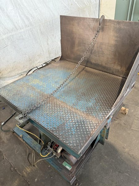 4,000 LB 48&quot; X 48&quot; HYDRAULIC TILT TABLE. STOCK # 1003825.