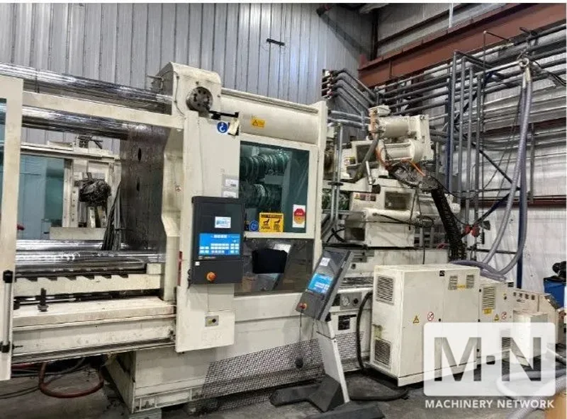650 TON KRAUSS MAFFEI MODEL CXZL 650-3000/1400/750  THREE SHOT INJECTION MOLDING MACHINE MFG 2010