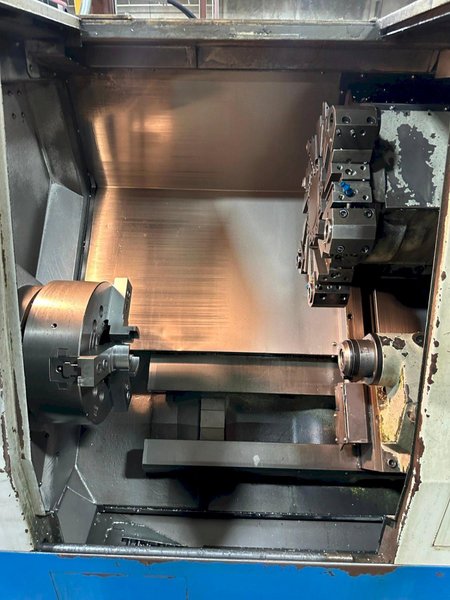 Doosan Daewoo Puma 300C CNC Lathe, 2005 – 15″ Chuck, Chip Conveyor, Programmable Tailstock