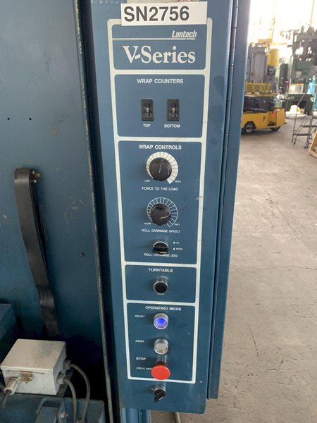 LANTECH V-SERIES DUAL TURNTABLE PALLET WRAPPER. STOCK # 0895024.