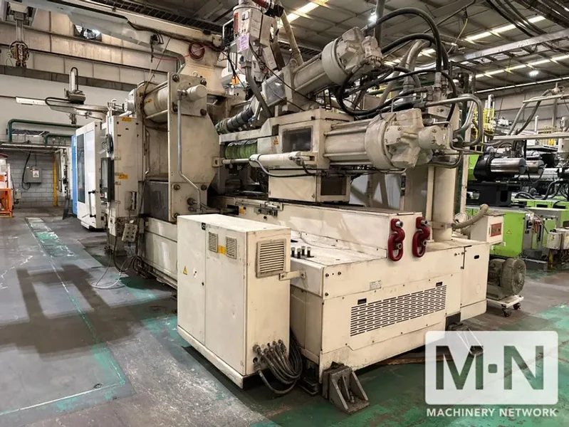 650 TON 58/39.5 OZ KRAUSS MAFFEI MODEL KM650-300-400CKZ 2-COLOR INJECTION MOLDING MACHINE MFG 2010