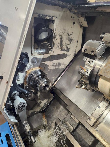 Doosan Puma 240B CNC Lathe, 2005 – Bar Feeder, Tailstock, Parts Catcher