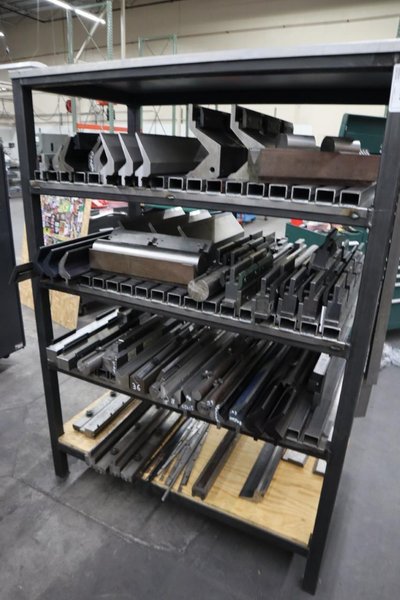 Amada Press Brake Dies, Ram Clamps and Lower Die Holders on Steel Rack- Auction Item