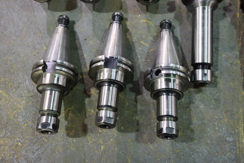 CT 40 Taper Tool Holders: (3) Nikken SK10 Collet Holders, (2) ER20 Collet Holders, (3) ER25 Collet Holders- Auction Item