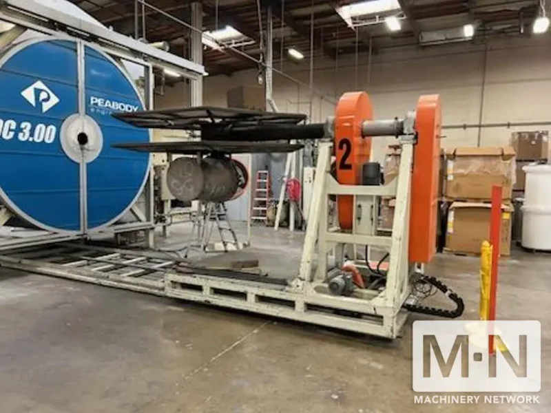 2 ARM ROTOLINE MODEL DC3.00XT ROTATIONAL MOLDING MACHINE MFG 2000