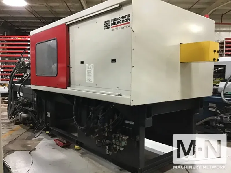 310 TON 36 OZ FERROMATIK MILACRON MODEL MT310-36 WIDE PLATEN INJECTION MOLDING MACHINE MFG 2001