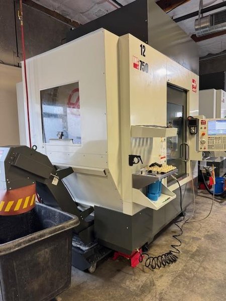 Haas UMC-750 5-Axis VMC, 2022 – 30” Travels, 15K Spindle, 50+1 Tools, TSC &amp; Chip Conveyor (1)