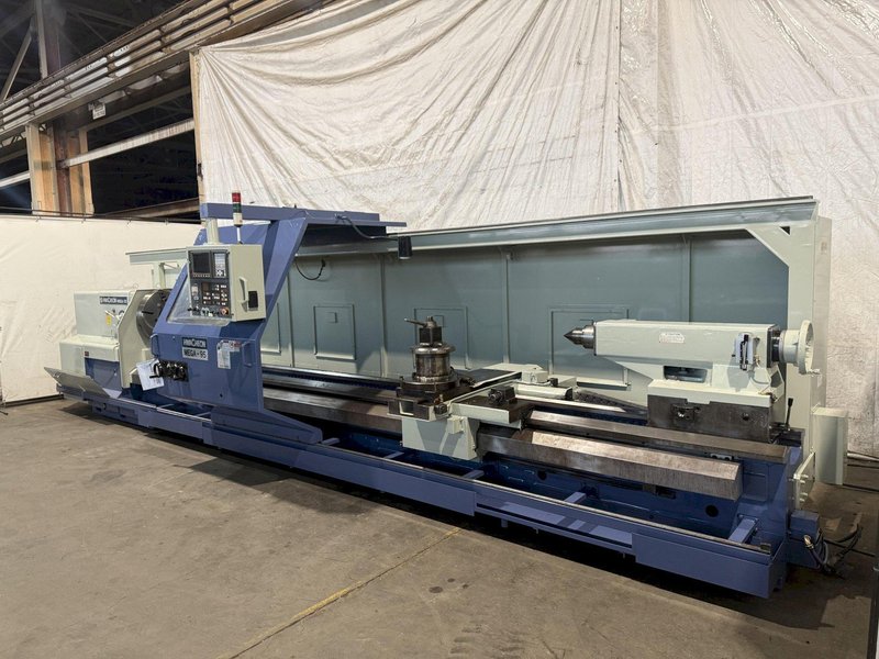 38.6" X 197" HWACHEON MEGATURN 95 CNC 9" HOLLOW SPINDLE OIL FIELD LATHE. STOCK # 0882125