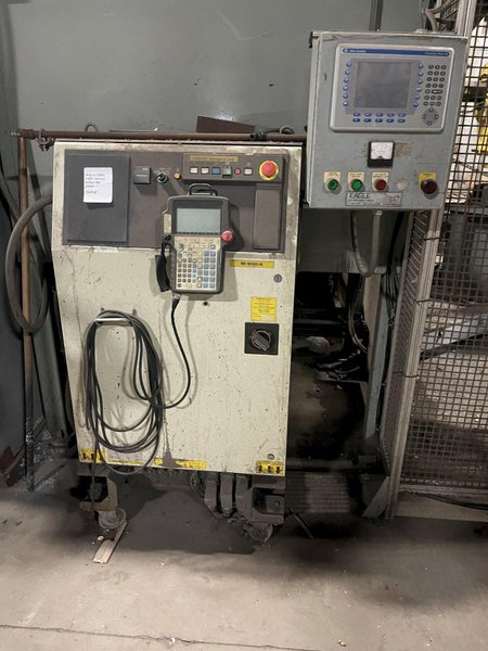 2005 Eagle automated saw and knockout system s/n 05027 with enclosure with light curtain, 2005 Fanuc robot model M-900iA 350 s/n r05743652 with Fanuc system R-J3iB controls s/n e05608535, with saw grips, Eagle enclosure with core knockout system, Allen Bradley plc with panelview 700, core butt discharge conveyor with drive, gate and riser dropoff, related conveyors