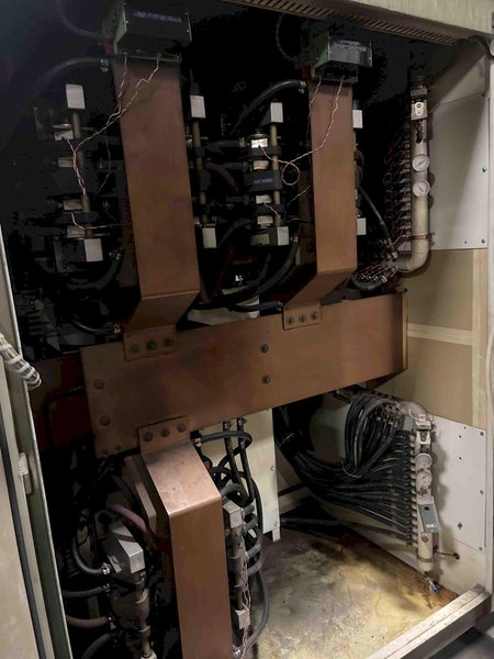 2000 Inductotherm model 1750-300 furnace power supply s/n 00f-123659-12 rated at 1750 kw, 1900 kva, 400 hz., 575 volt, with remote panel control box, original drain/feed manifolds