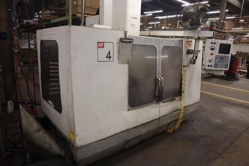 Haas VF-4 CNC Vertical Machining Center, 20 Station Carousel  Tool Changer, 7500 RPM Spindle, Chip Auger, Programmable Coolant- Auction Item