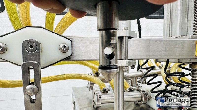 Inline Filling Systems  | Six-Headed Semi-Automatic  |  Overflow Filler