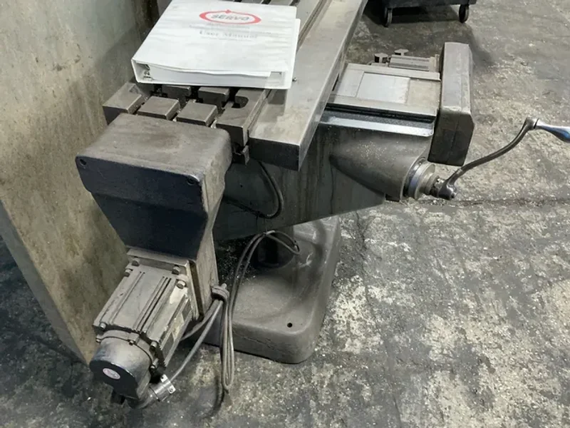 BRIDGEPORT 9”X42” TABLE CNC VERTICAL MILL