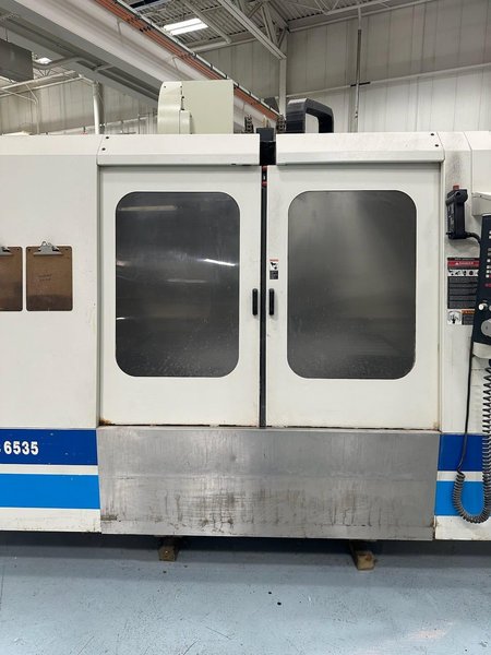 Fadal VMC 6535 VHT Machining Center, 2004 – 10K Spindle, 32 ATC, Chip Conveyor, Siemens