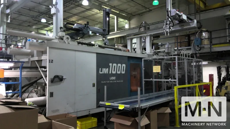 1000 TON 185 OZ UBE MODEL UM1000 INJECTION MOLDING MACHINE MFG 1999