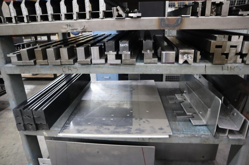 Press Brake Dies and Lower Die Holders Tall and Short for Amada Press Brakes on Welded Steel Shelving- Auction Item