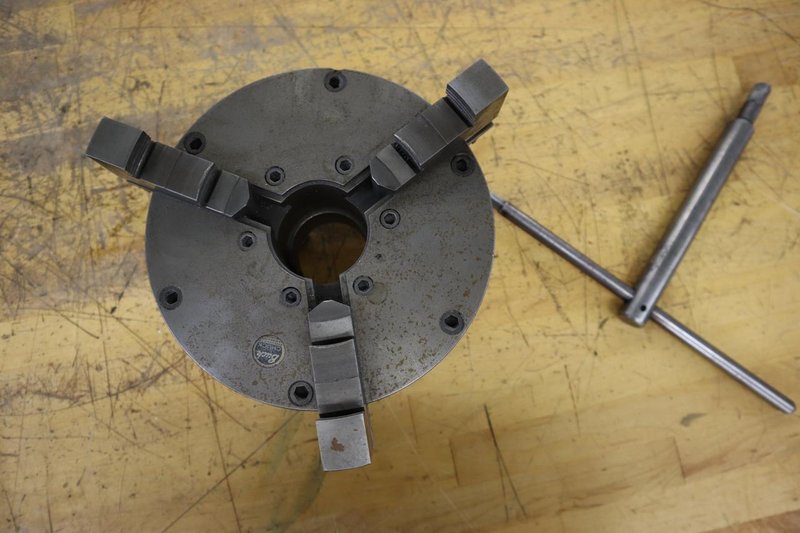 Buck 8.25" 3-Jaw Chuck, D1-4" Camlock Back, 2" Hole, Chuck Wrench- Auction Item