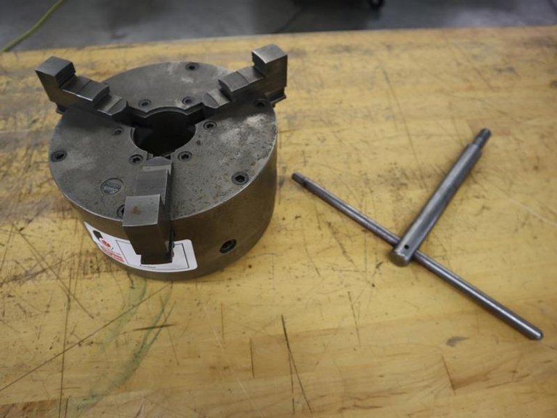 Buck 8.25" 3-Jaw Chuck, D1-4" Camlock Back, 2" Hole, Chuck Wrench- Auction Item