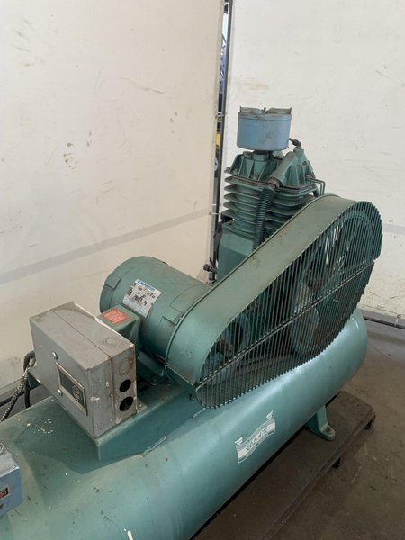 5 HP ROL-AIR HORZONTAL AIR COMPRESSOR. STOCK # 0469124.