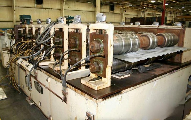 32 STAND X 4 1/2" X 70" TISHKEN 32-XHW-4 ROLLFORMER. STOCK # 0879526