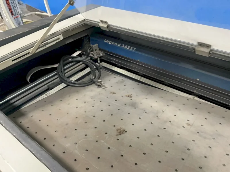 EPILOG CORP. LASER ENGRAVING AND CUTTING MACHINE   -  9000 LASER SYSTEM
