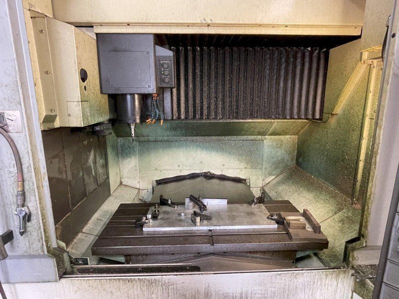 2014 Okuma Genos M560-V Bridge-Style CNC Vertical Machining Center with OSP-P300M Control
