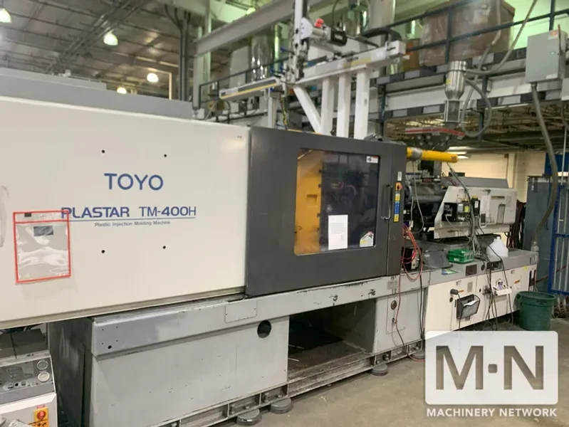 400 TON 45.3 OZ TOYO MODEL TM-400H INJECTION MOLDING MACHINE MFG 2000